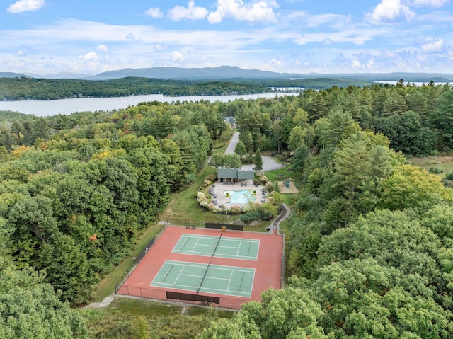 aerial view featuring a water and mountain view