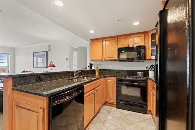 kitchen featuring black appliances, crown molding, sink, dark stone countertops, and kitchen peninsula