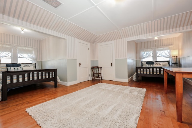 bedroom with hardwood / wood-style floors