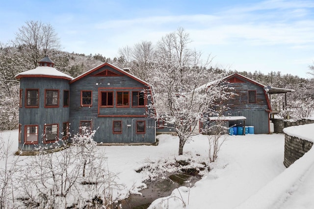 view of snow covered property