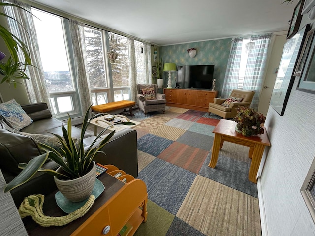 living room with carpet flooring and floor to ceiling windows