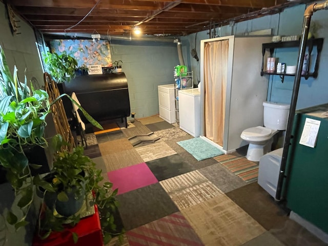 basement with washing machine and clothes dryer