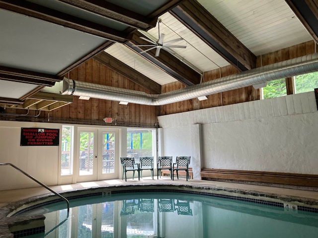 view of swimming pool featuring ceiling fan