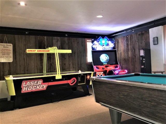 game room with carpet flooring, wooden walls, and billiards