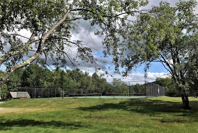 view of yard featuring tennis court