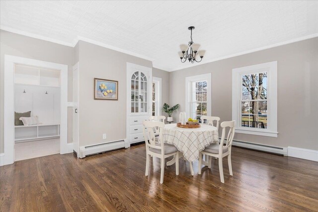 dining space with baseboard heating, dark wood-type flooring, and a notable chandelier