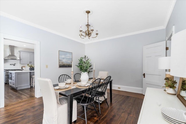 dining space with dark hardwood / wood-style flooring, an inviting chandelier, and crown molding