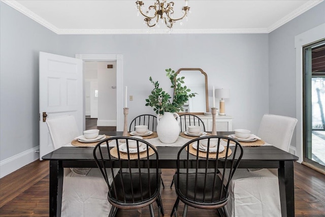 dining space with crown molding, a chandelier, and dark hardwood / wood-style floors