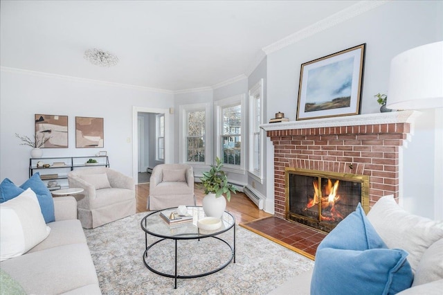 living room with crown molding, wood-type flooring, a baseboard radiator, and a brick fireplace