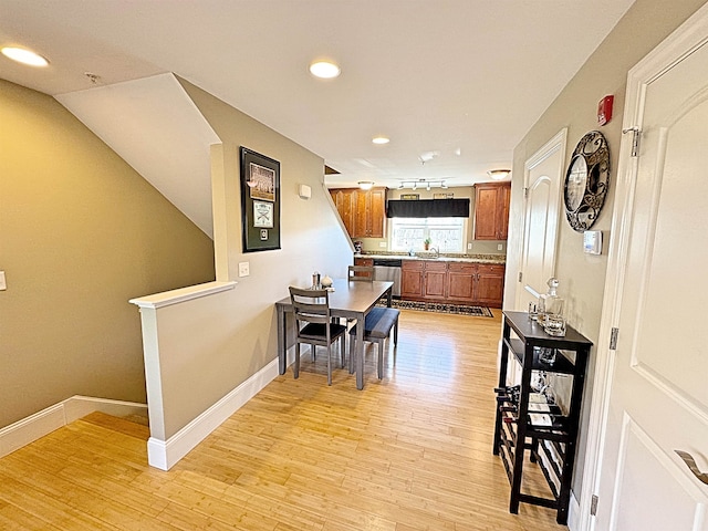 dining space featuring light hardwood / wood-style flooring