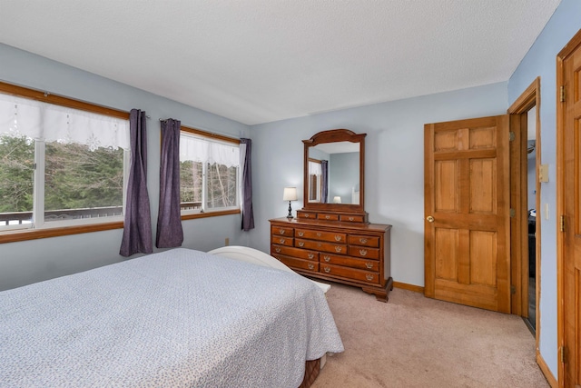 carpeted bedroom with a textured ceiling