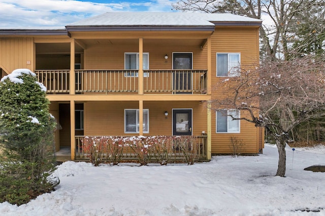 view of snow covered property