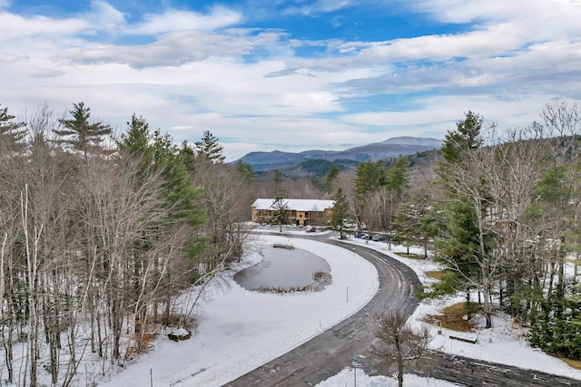 surrounding community with a mountain view