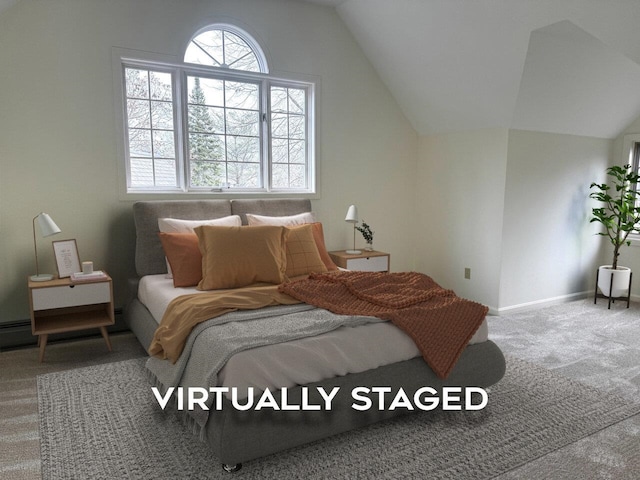 bedroom featuring carpet flooring and vaulted ceiling