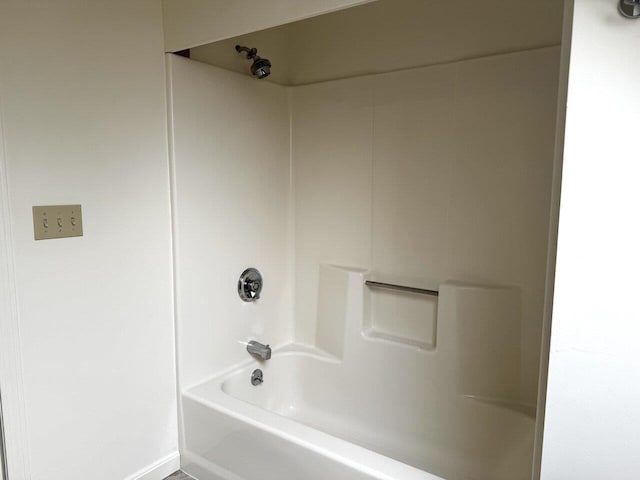 bathroom with shower / bathtub combination