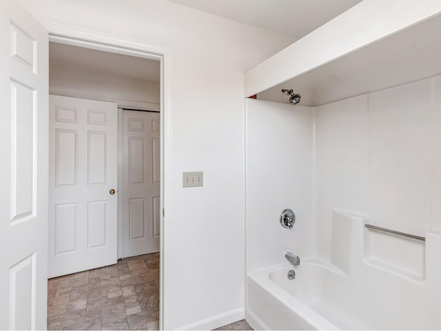 bathroom with shower / bathtub combination