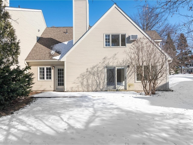 view of snow covered property