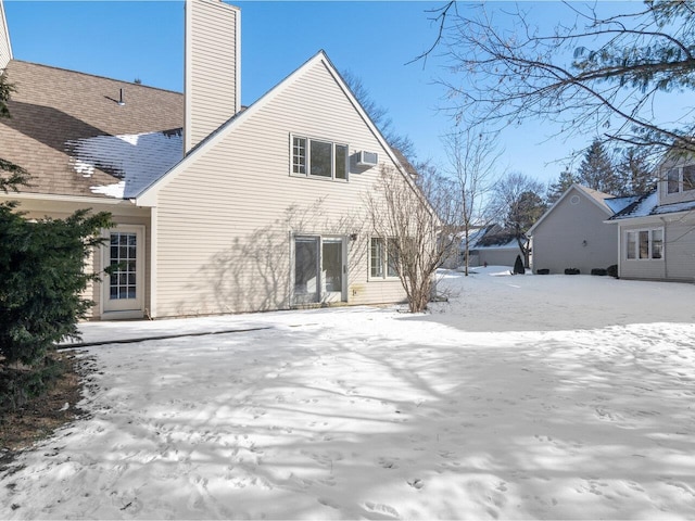 view of snow covered house