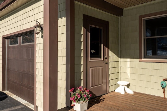 property entrance featuring a garage