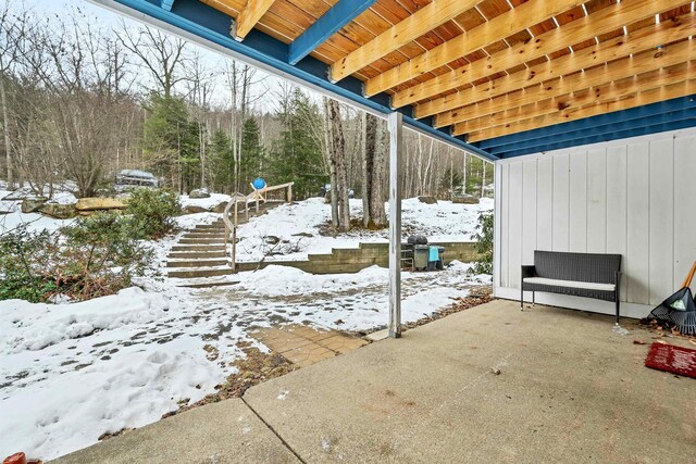 view of snow covered patio