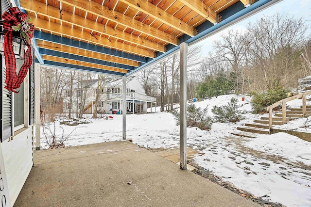 view of snow covered patio