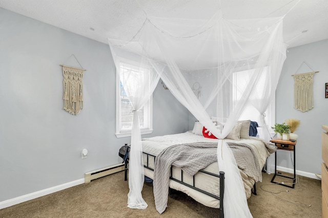 bedroom featuring a baseboard radiator and carpet flooring