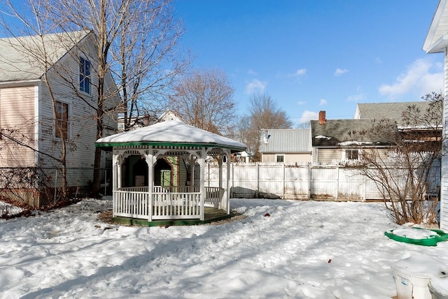 snow covered deck with a porch