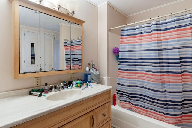 bathroom featuring shower / bath combination with curtain, ornamental molding, and vanity