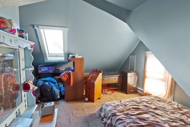 carpeted bedroom with vaulted ceiling