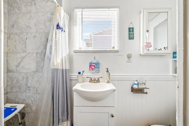 7 Perkins Ave Unit A, Hampton, NH 03842 - full bath featuring a wainscoted wall, vanity, and a shower with shower curtain