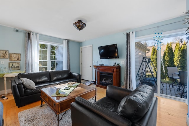 living room with light hardwood / wood-style floors