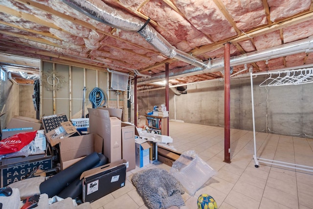 basement with tile patterned floors