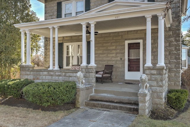 doorway to property featuring a porch