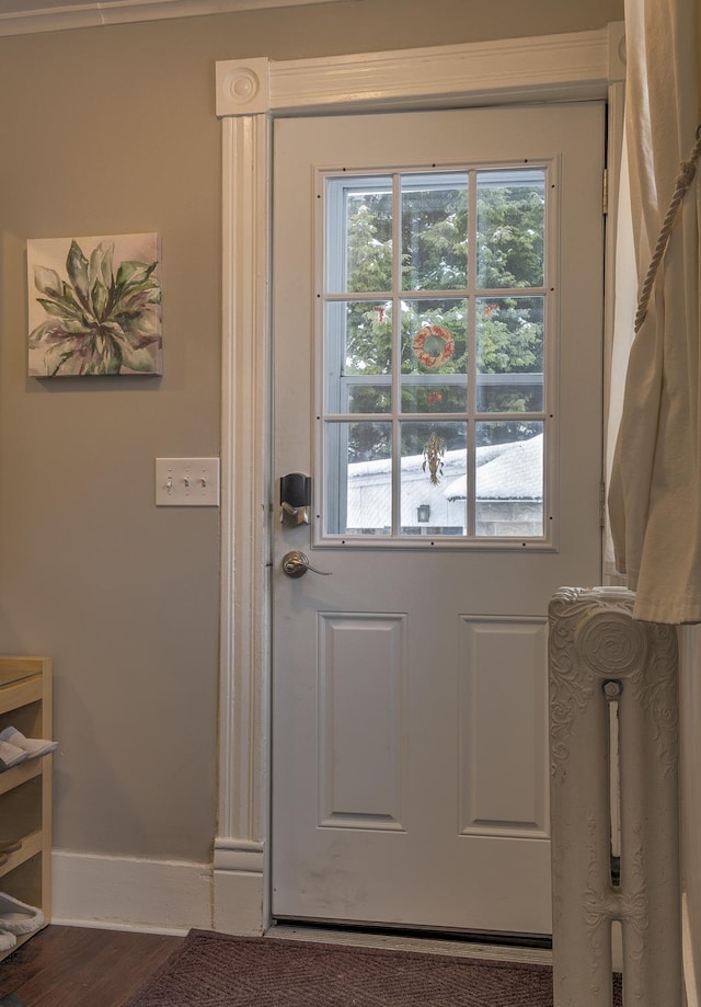 doorway to outside with hardwood / wood-style flooring