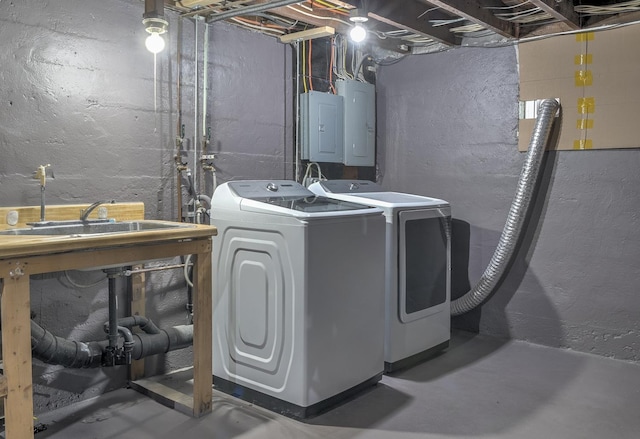 laundry area featuring separate washer and dryer and electric panel