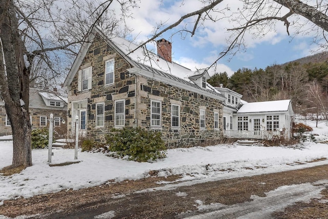 view of snow covered property