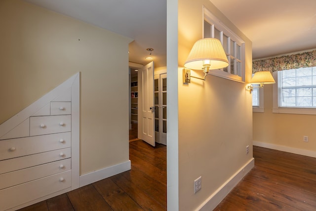 hall with dark hardwood / wood-style floors