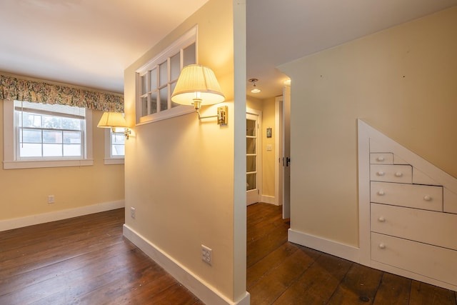 hallway featuring dark hardwood / wood-style floors