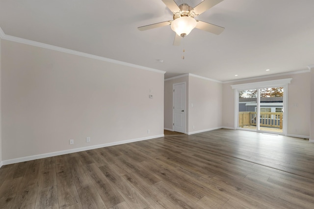 empty room with hardwood / wood-style flooring, ceiling fan, and ornamental molding