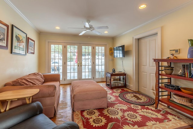 living room with french doors, light wood-type flooring, ceiling fan, and ornamental molding