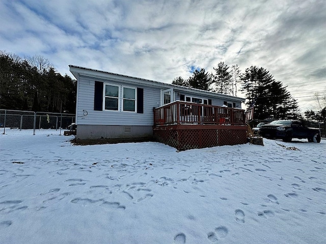 view of front of home with a deck