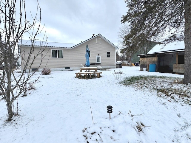 view of snow covered property