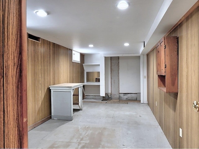 basement with wood walls