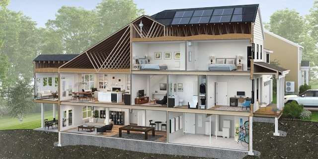 rear view of house featuring an outdoor hangout area and solar panels