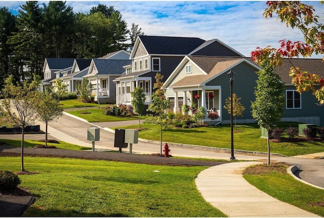 view of property's community featuring a yard