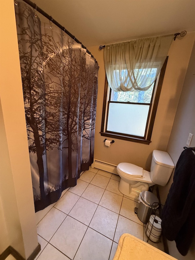 full bathroom featuring tile patterned floors, a baseboard heating unit, toilet, and a shower with shower curtain