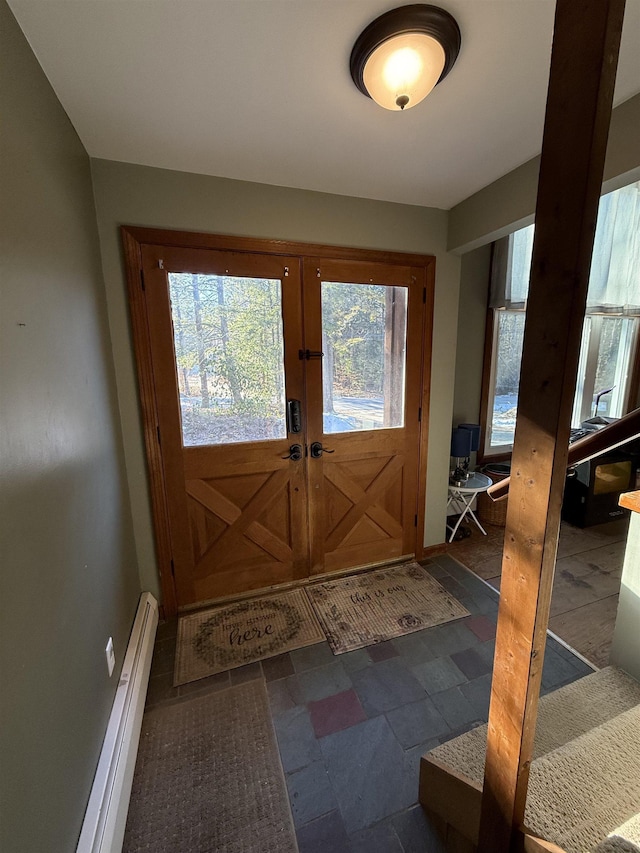 entrance foyer with stone tile floors