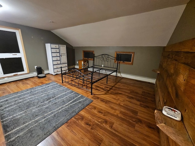 bedroom with a baseboard radiator, baseboards, lofted ceiling, and wood finished floors