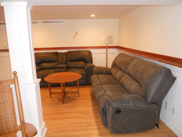 living room with light hardwood / wood-style floors