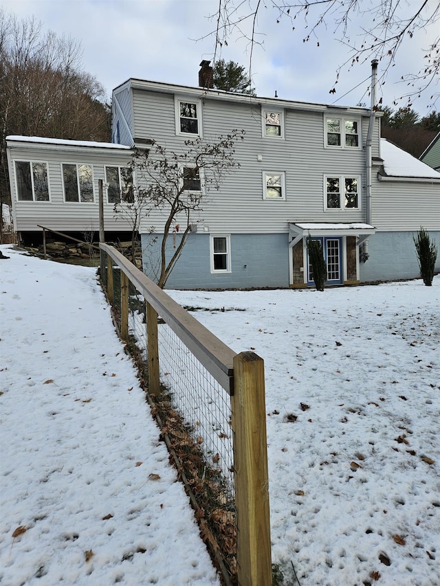 view of snow covered property